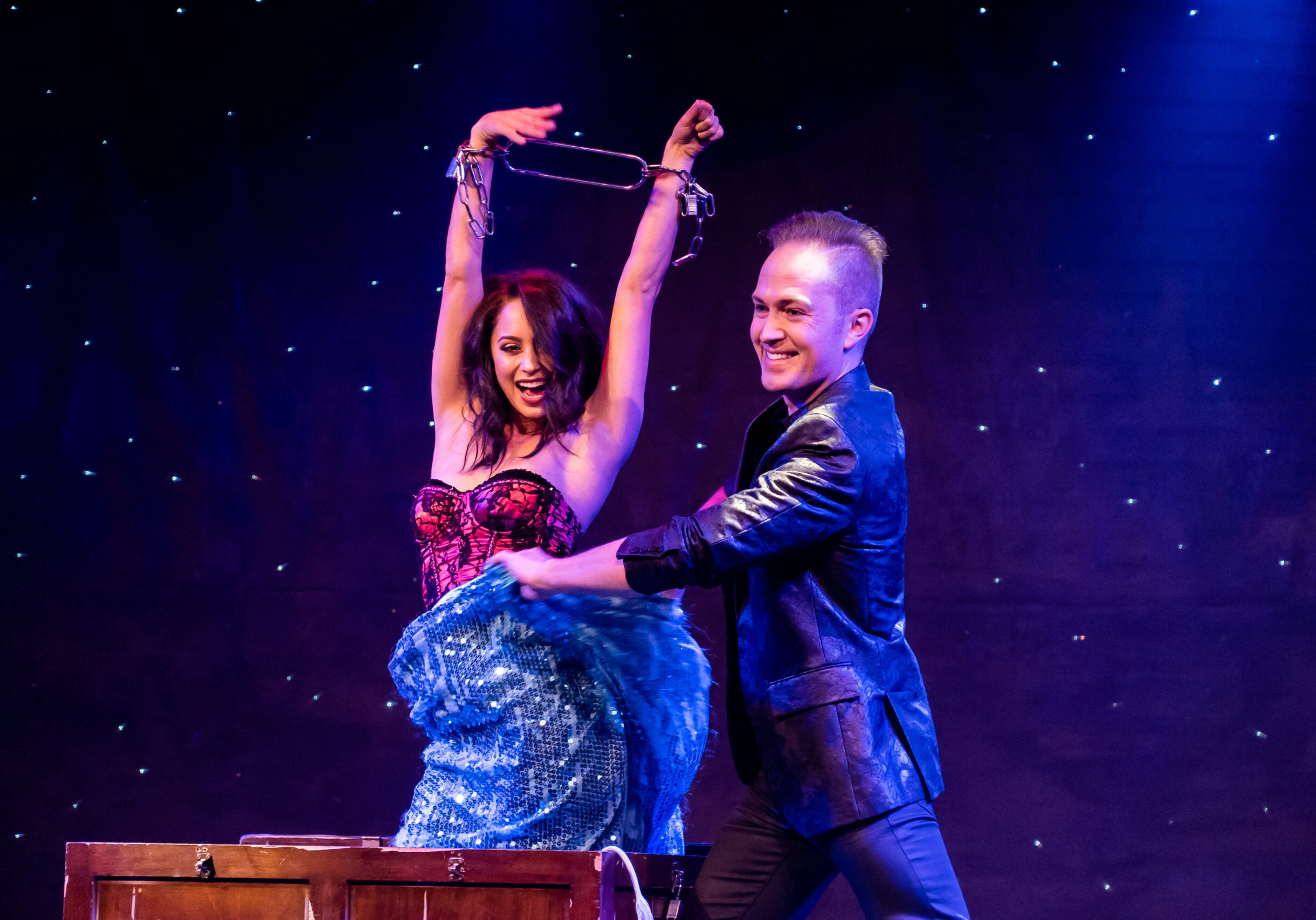 Los Angeles magician Ryne Strom performing Harry Houdini's Sub Trunk live on stage